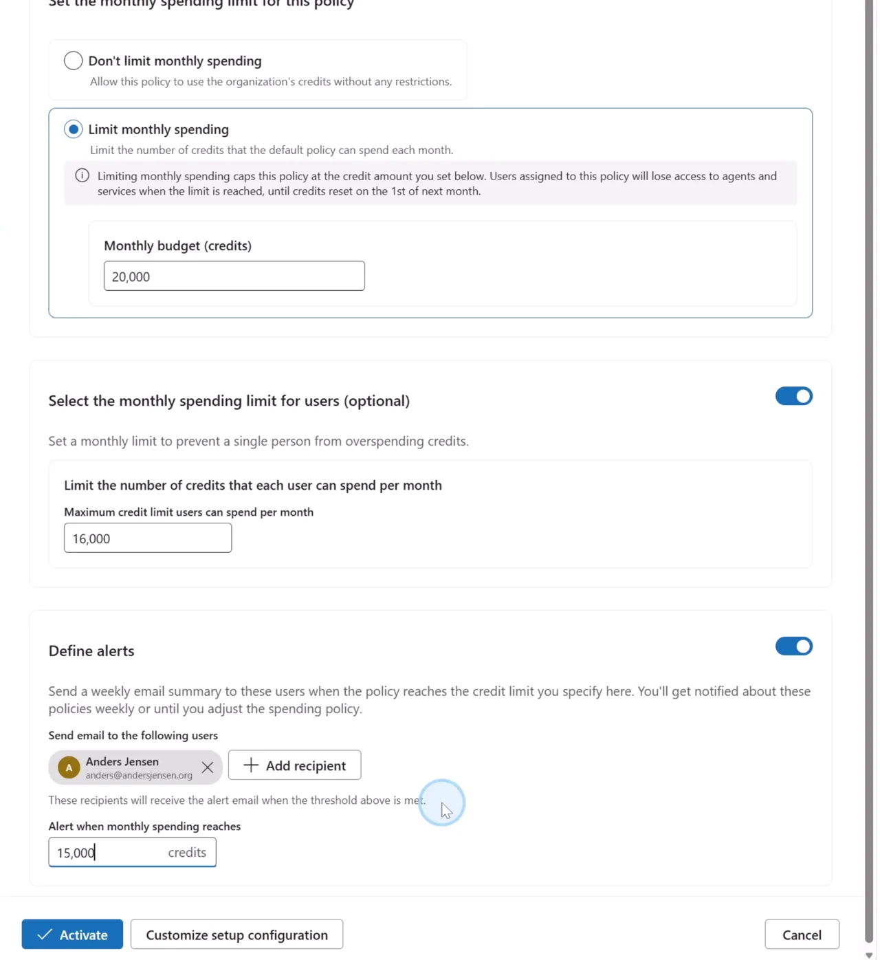 Setting up a spending policy with a monthly limit of 20,000 credits, a per-user limit of 16,000, and an alert at 15,000 credits